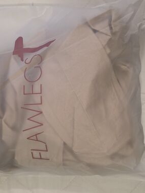 Flawless Nude Garment in Branded Packaging
